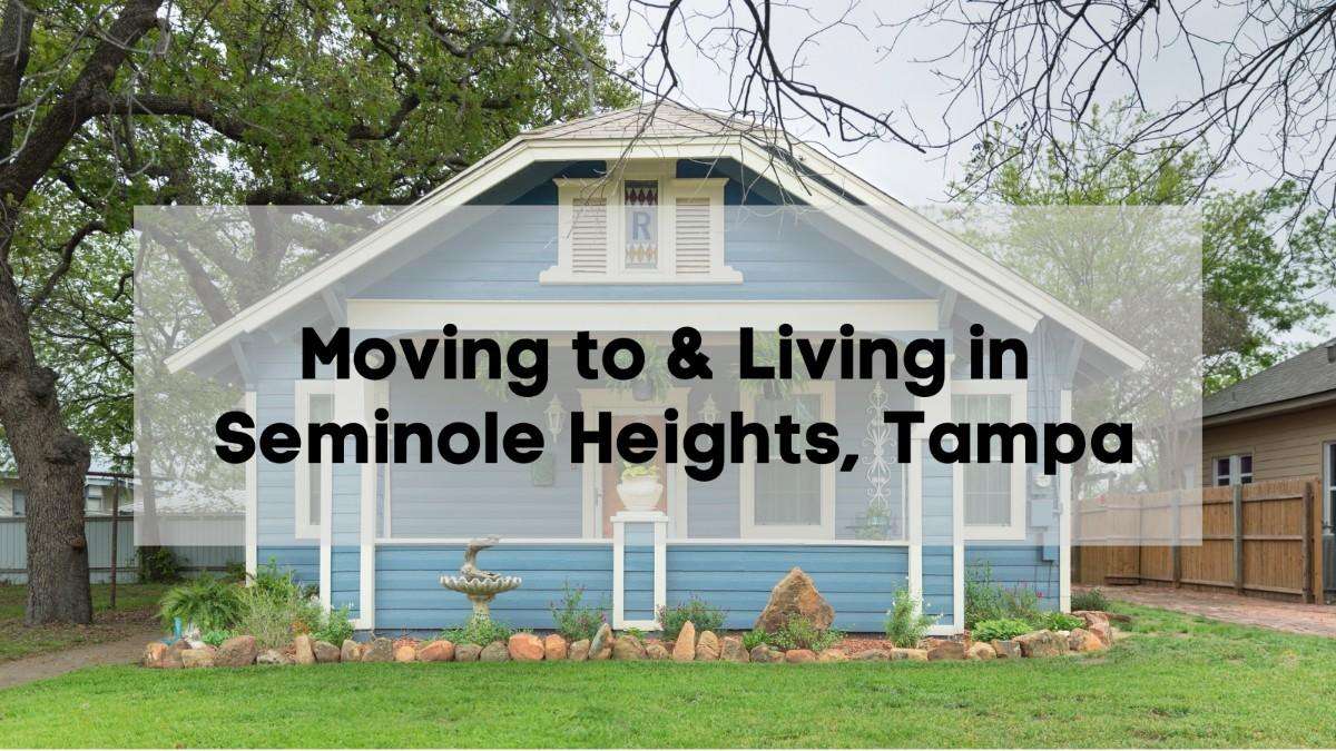 Blue historic bungalow-style home with a front porch in Seminole Heights Tampa, a popular neighborhood for families and professionals moving to Seminole Heights with help from 2 College Brothers.